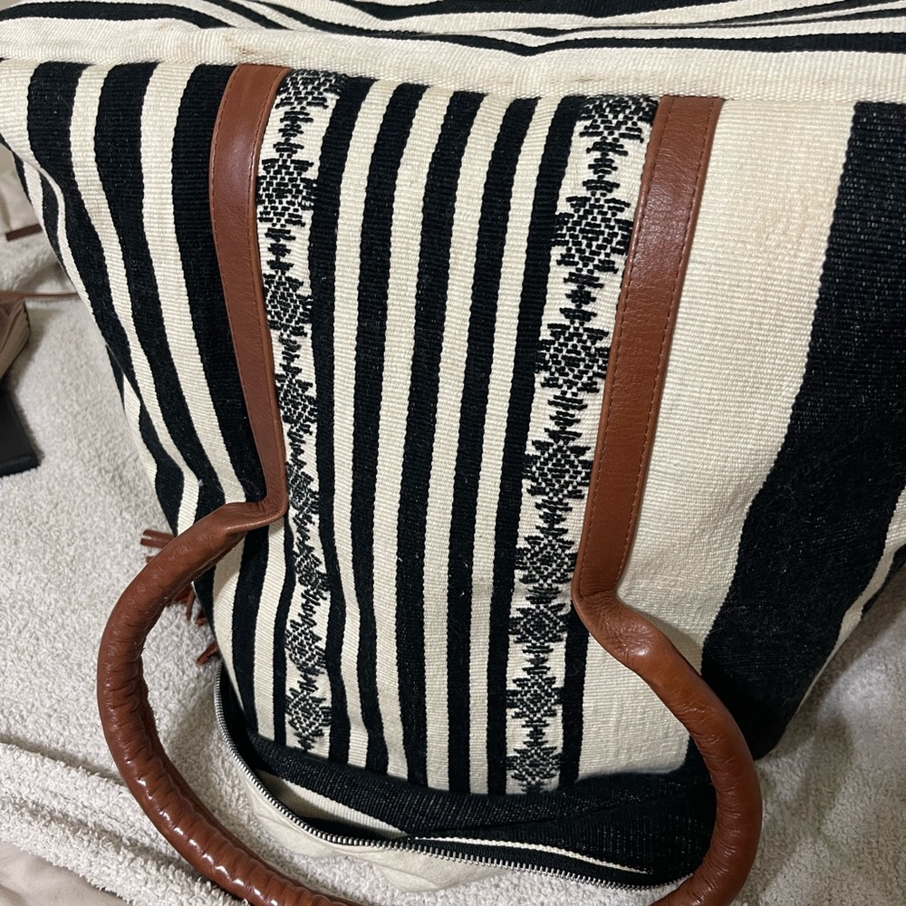 Elegant Black and White Striped Backpack with Brown Accents - Picture 5 of 9